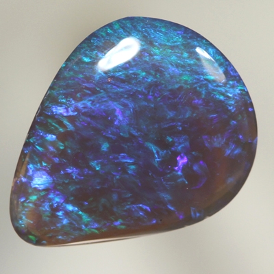 SOLID BLACK CRYSTAL OPAL Bright green sparkles in a 3D pattern